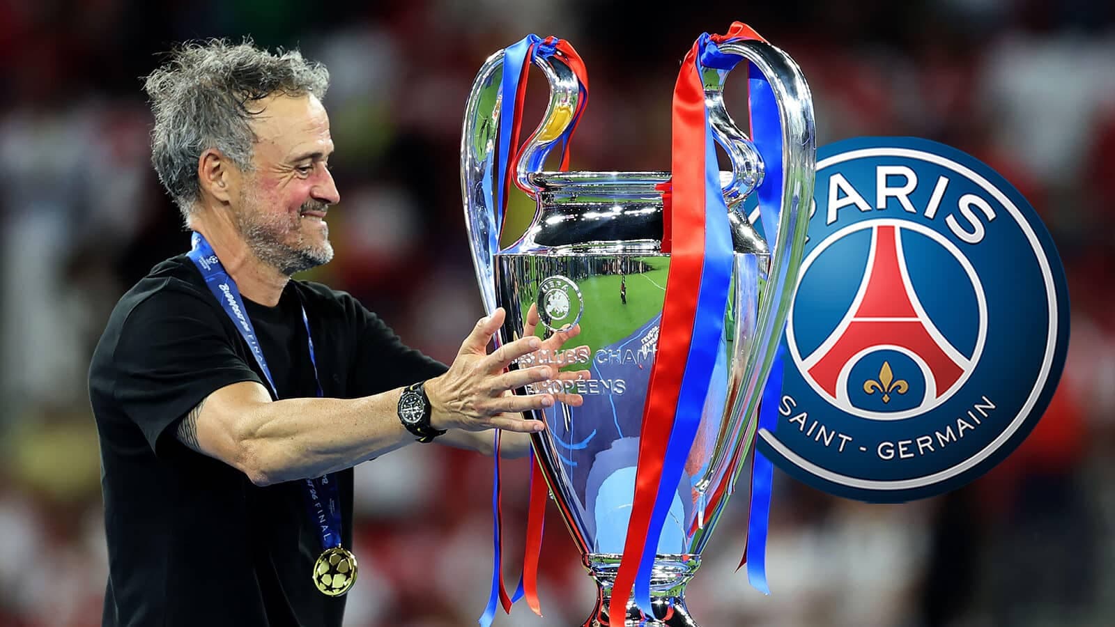 Entrenador sosteniendo la UEFA Champions League con PSG