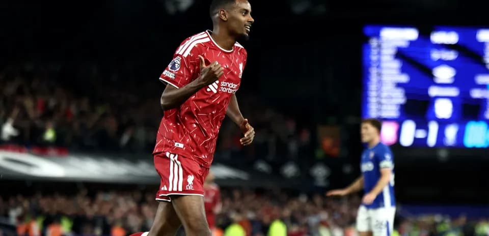 Jugador de Liverpool celebrando un gol en partido