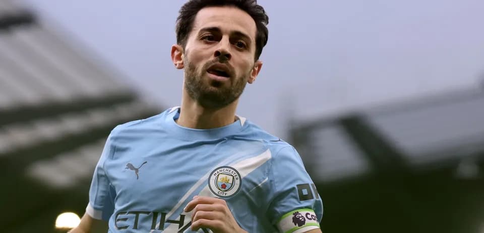 Jugador de Manchester City corriendo durante un partido