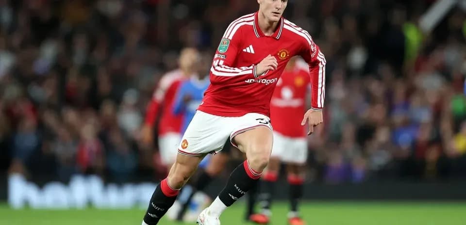 Jugador de Manchester United corriendo durante un partido