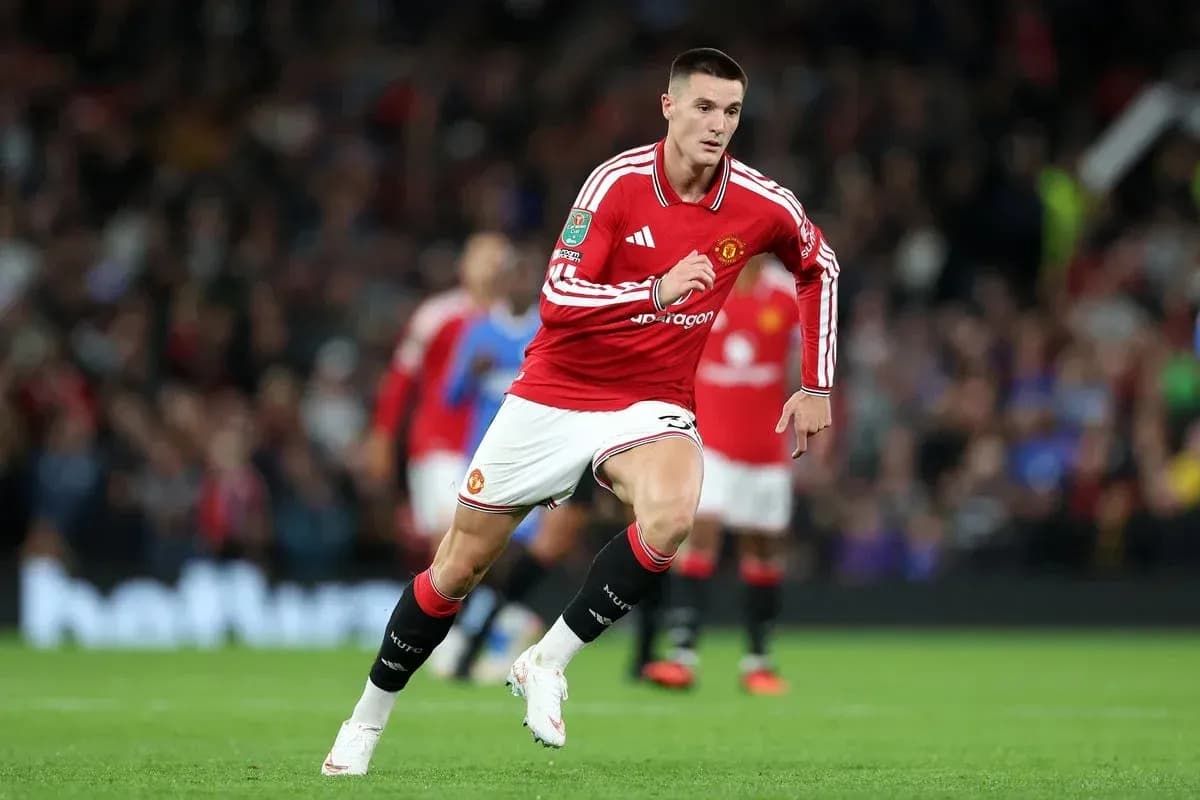 Jugador de Manchester United corriendo durante un partido