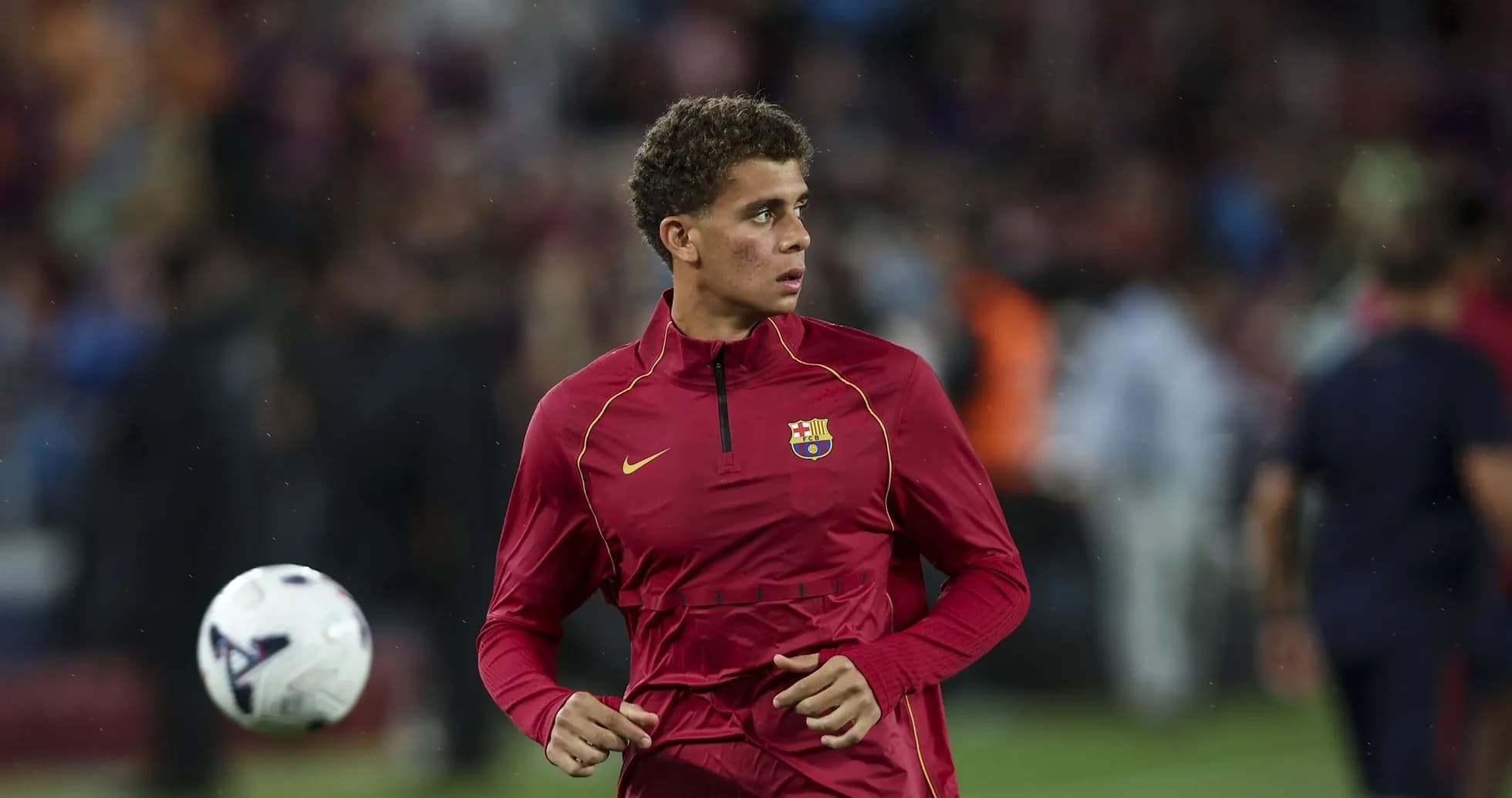Jugador de Barcelona calentando antes del partido