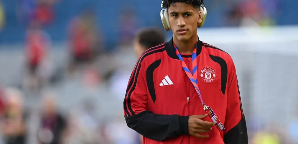 Jugador de Manchester United con auriculares antes del partido