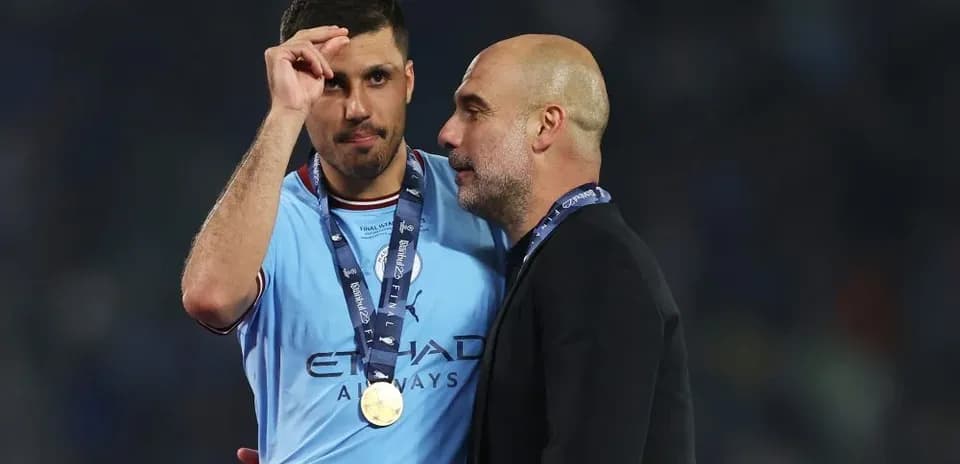 Jugador y entrenador de Manchester City tras la final