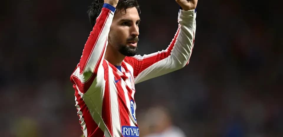 Jugador levantando los brazos en celebración