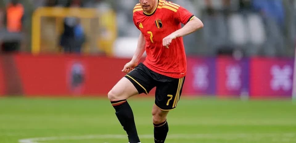 Jugador belga controlando el balón en el partido
