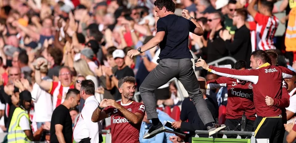 Celebration of players and fans during match