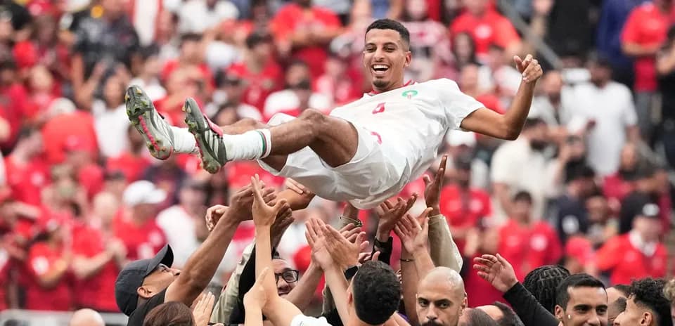 Celebración de jugadores de Marruecos en el estadio