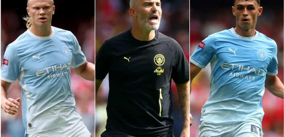 Jugadores de Manchester City en acción durante partido