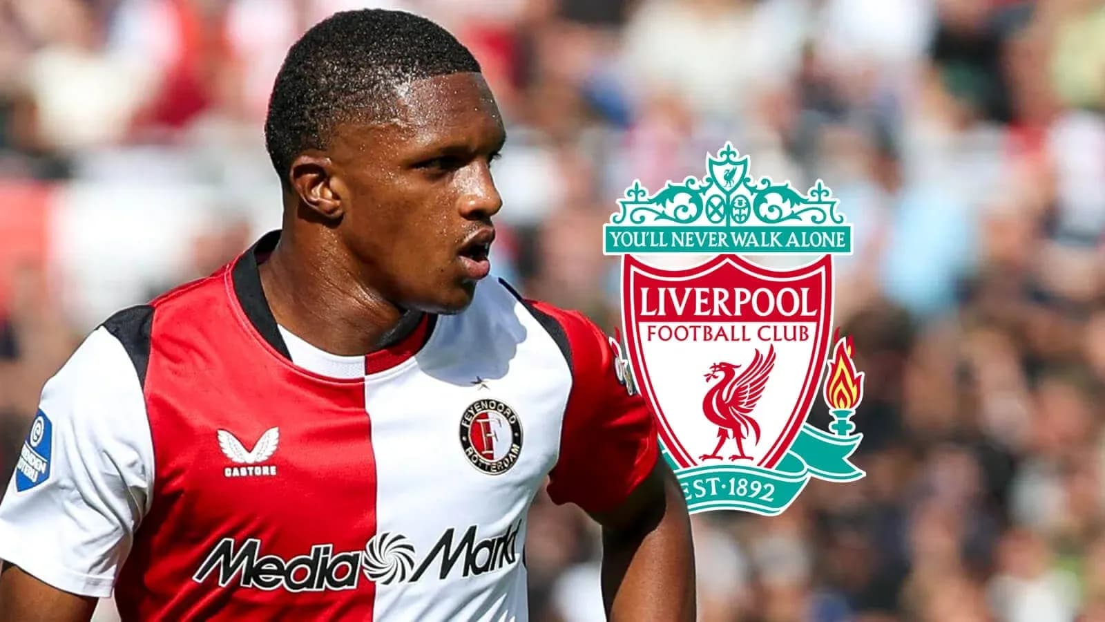Jugador de Feyenoord con logo de Liverpool de fondo Jugador de Feyenoord con logo de Liverpool de fondo