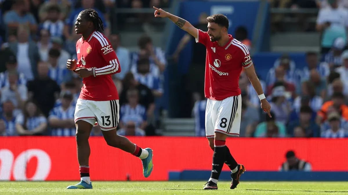 Jugadores de Manchester United en acción Jugadores de Manchester United en acción