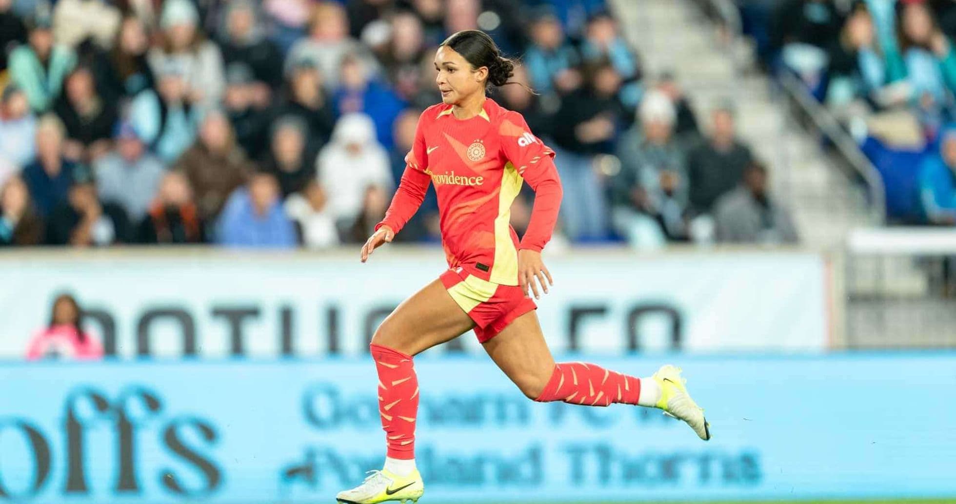 Jugadora de Portland Thorns en acción Jugadora de Portland Thorns en acción