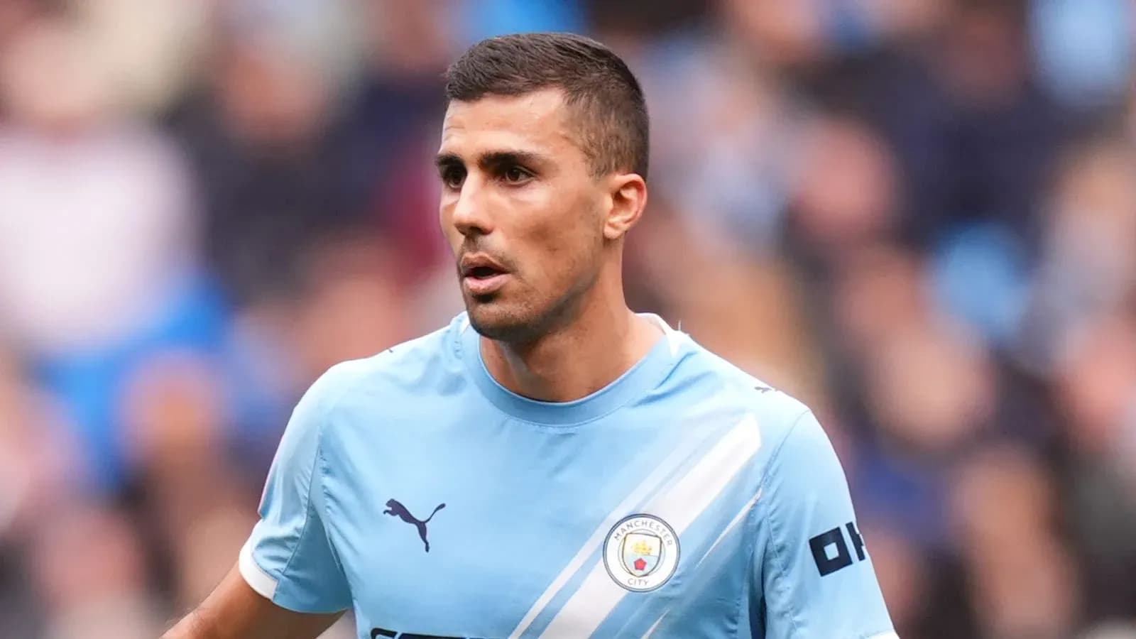 Jugador de Manchester City en acción durante partido Jugador de Manchester City en acción durante partido